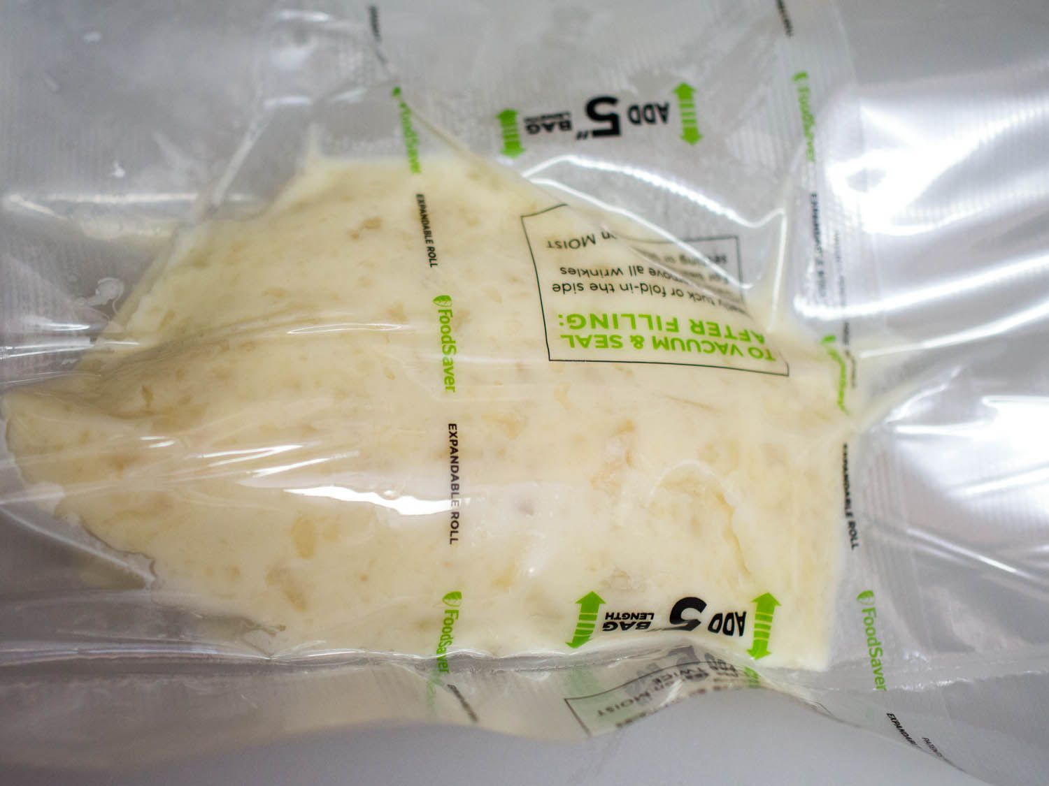 Mashed potatoes sealed in a plastic bag, for sous vide heating.