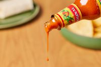 Cholula Original Hot Sauce being poured