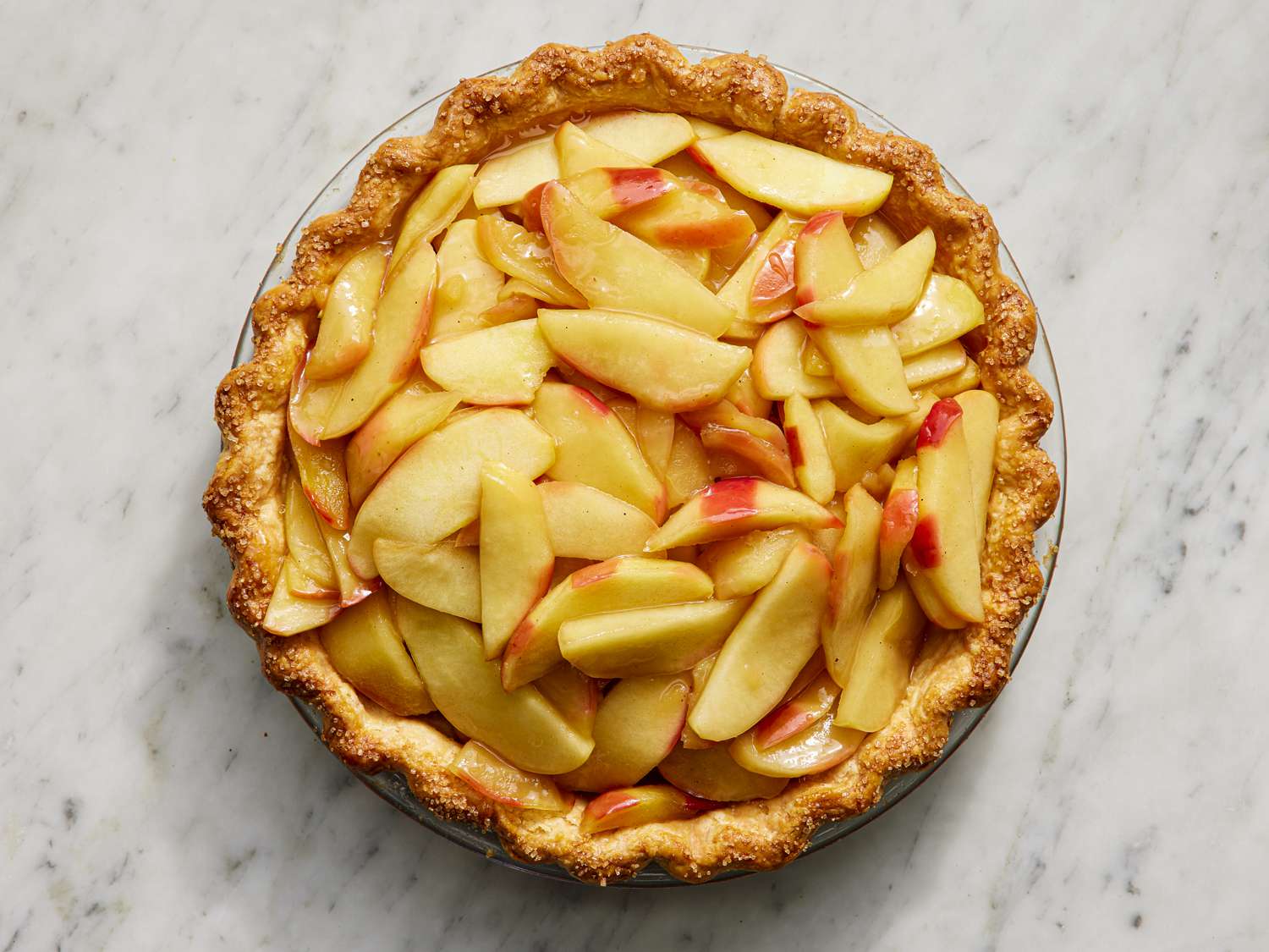 Cooked apples placed in crust