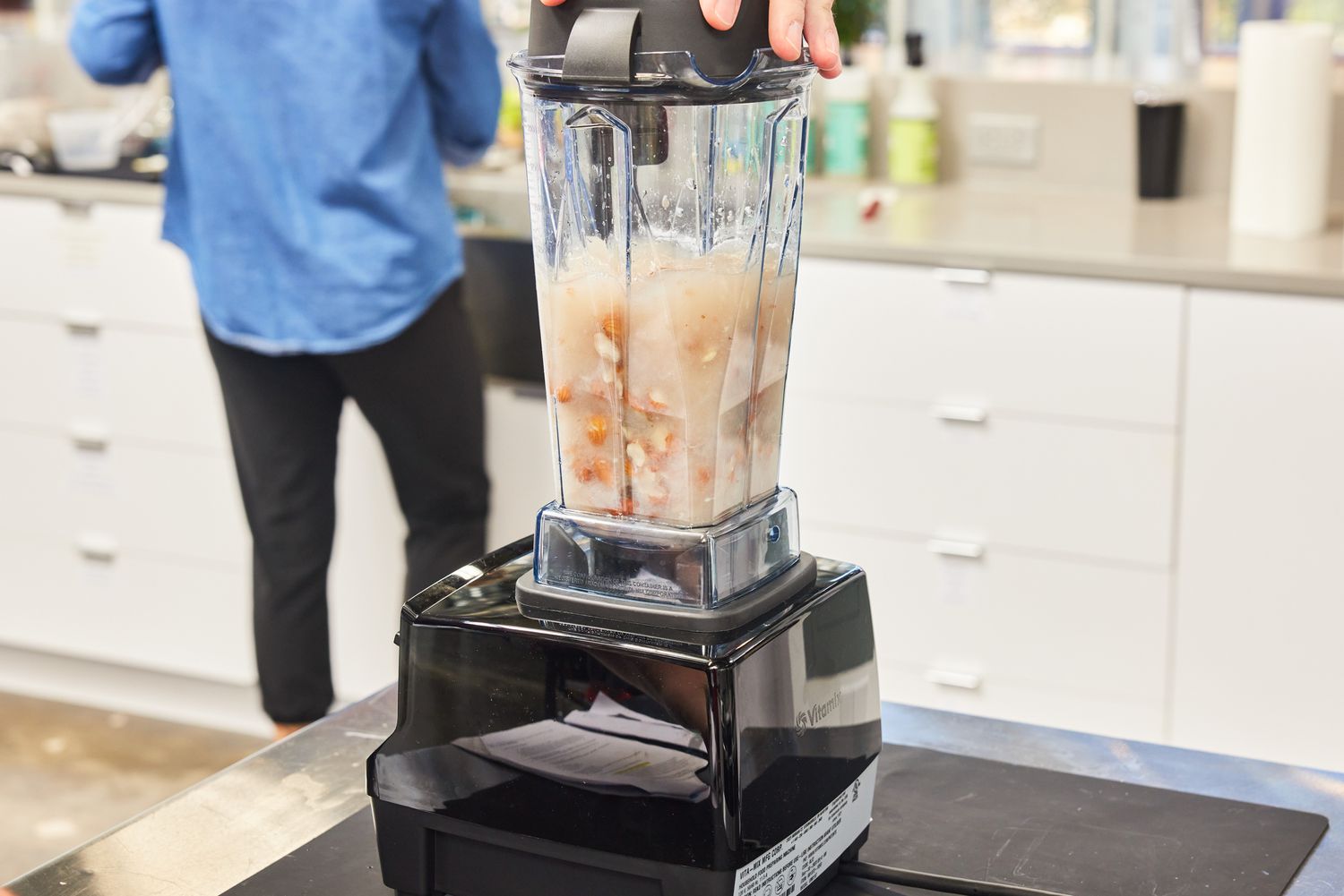Vitamix 5200 Professional-Grade Blender blending almonds and liquid