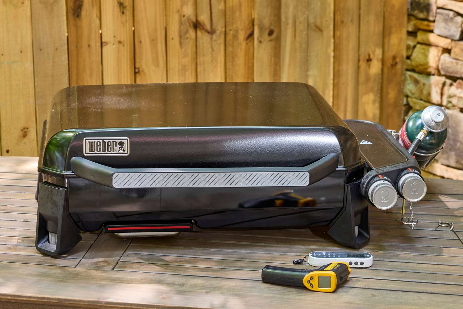 The Weber Slate 22 inch Rust-Resistant Tabletop Griddle on a table