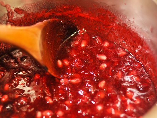Pomegranate arils are stirred into the sauce.