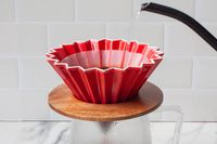 Water being poured into the Origami dripper