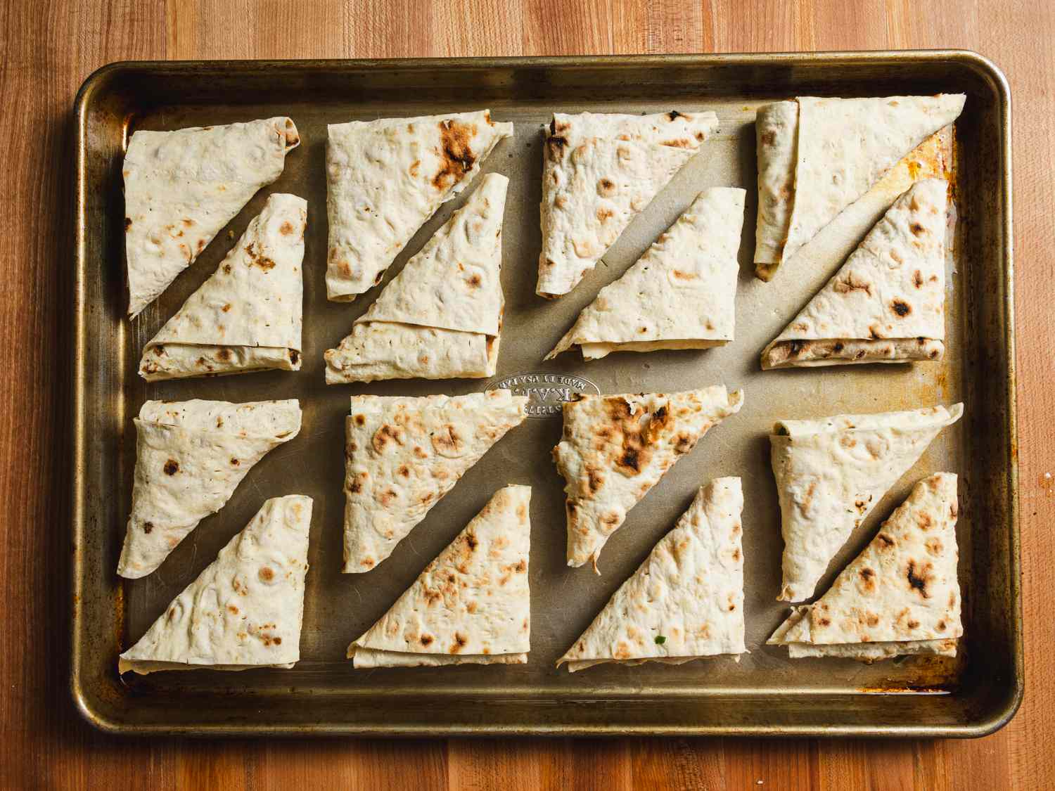 Lavash triangles on a sheet pan.