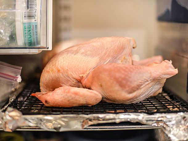 Profile view of a dry-brined chicken after brining/drying overnight in the refrigerator.