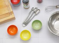 three pinch bowls on a white tile surface