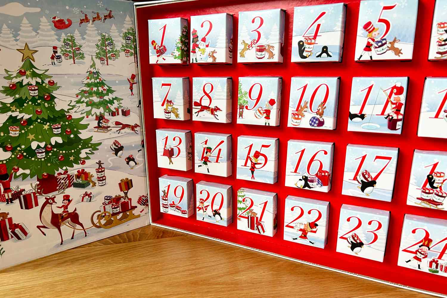 The Bonne Maman Advent calendar propped open on a table.