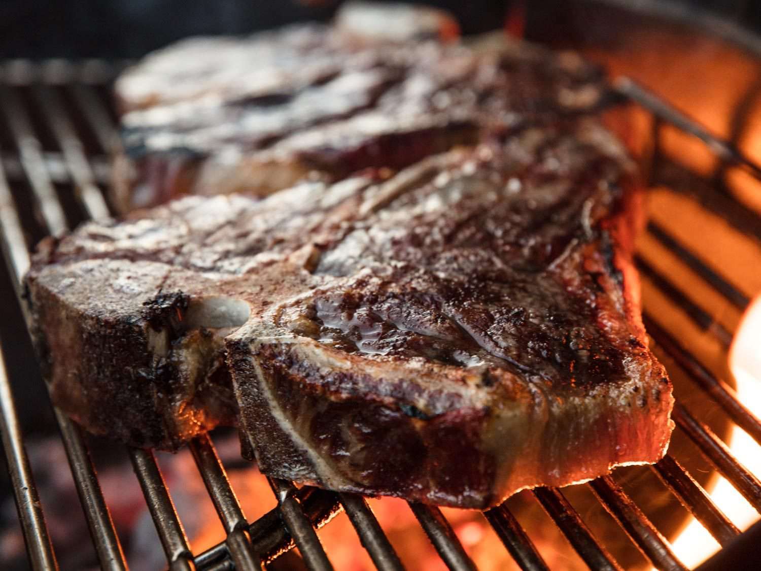 Steak cooking on the grill