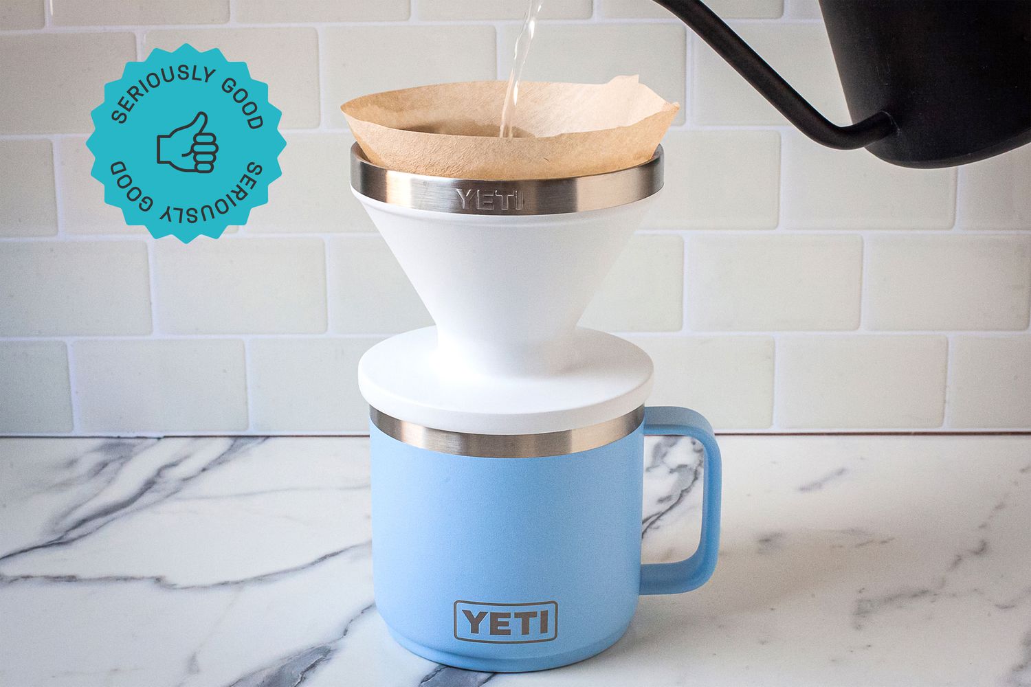 Water being poured from a gooseneck kettle the Yeti pour-over.