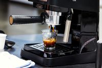 Close up of the De'Longhi Stilosa Espresso Machine brewing an espresso