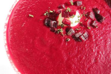 Closeup of Roasted Beet Soup with Thyme, Lemon, and Crème Fraîche.