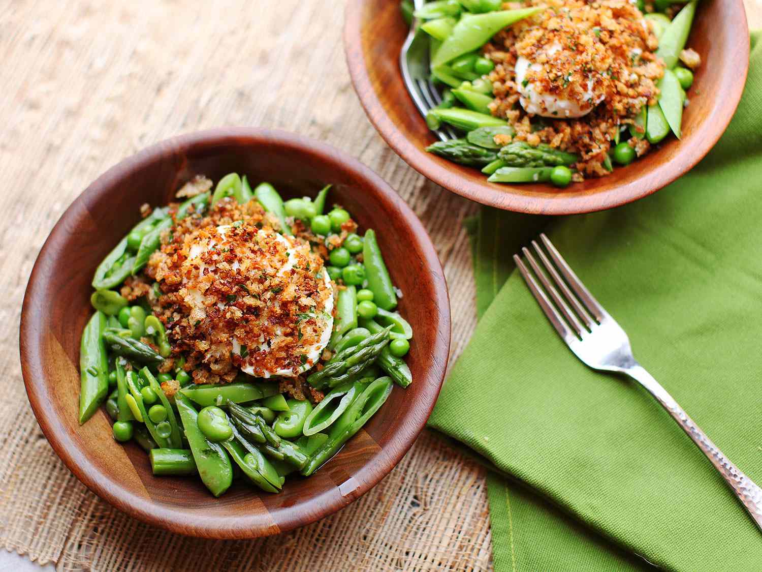 Overhead view of two platings of the finished salad.