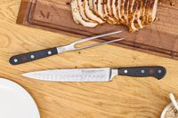 The Wüsthof Classic Carving Set on a cutting board