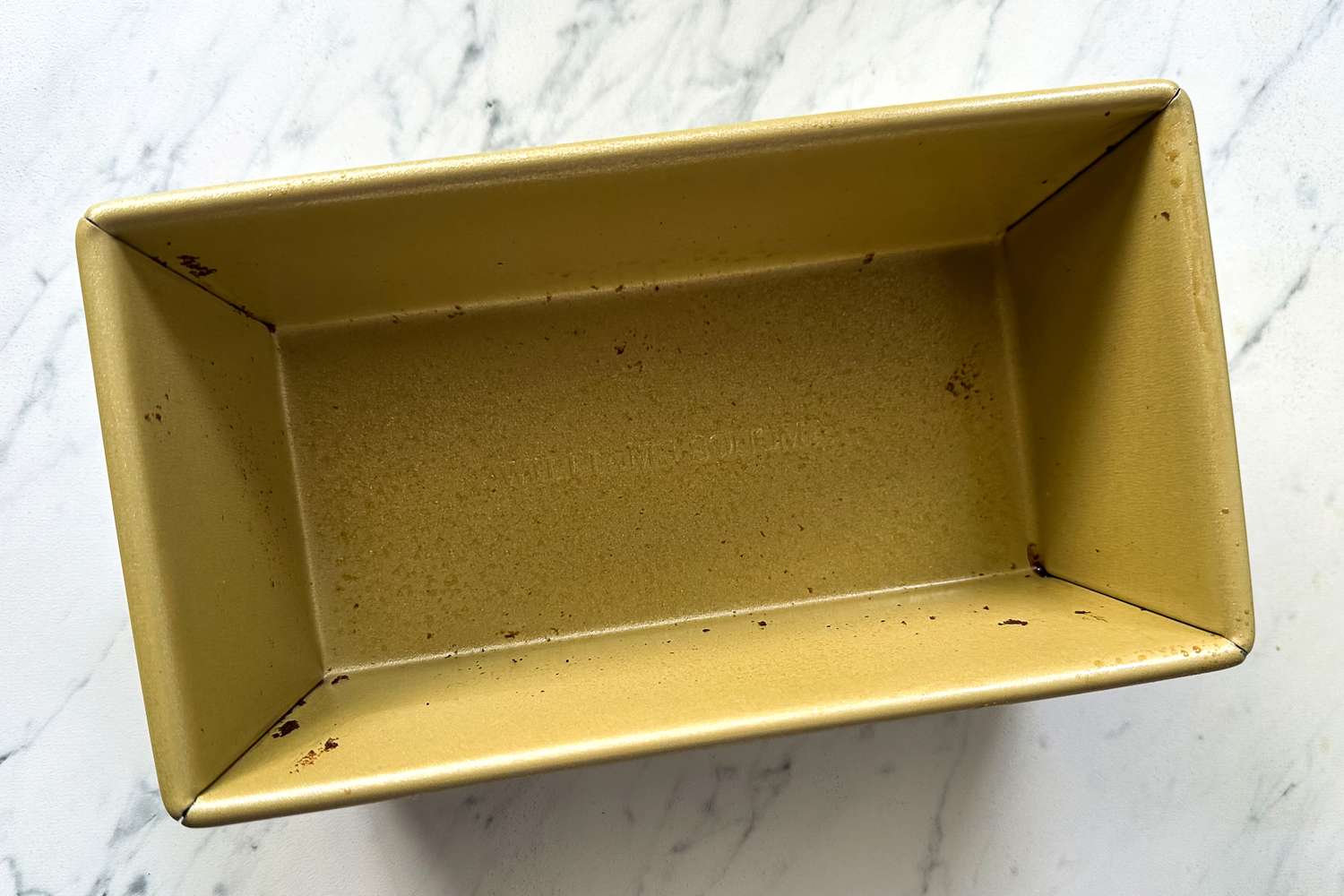 The inside of the Williams Sonoma Goldtouch Pro Nonstick Loaf Pan after use