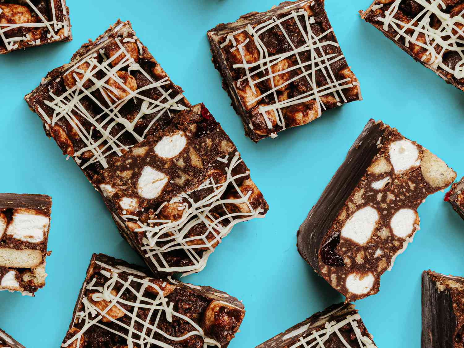 Rocky Road squares places randomly on a light blue background 