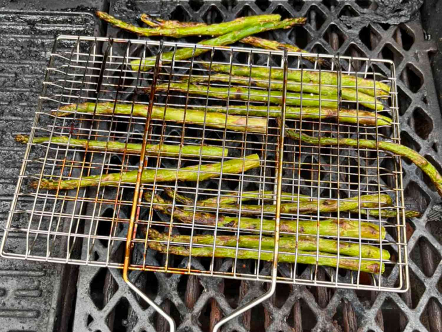 Asparagus in a grill basket.