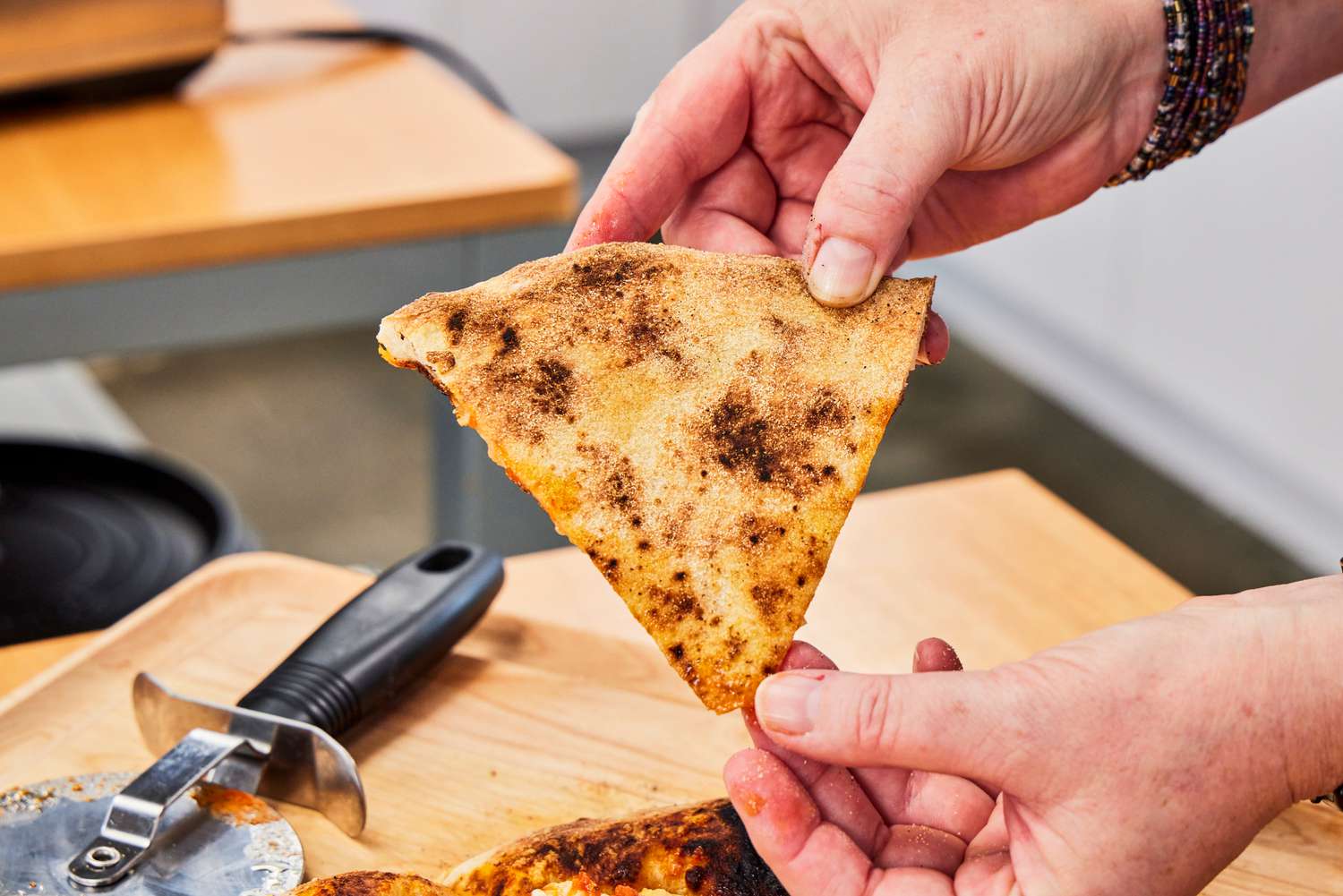 The crust on the bottom of the Breville Smart Oven Pizzaiolo Pizza Oven