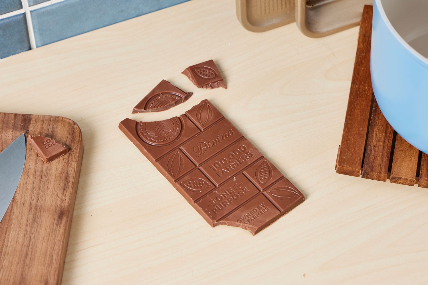 An unwrapped Divine milk chocolate bar.