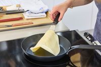 A crepe is made in the OXO Obsidian 10 Inch Pre-Seasoned Carbon Steel Frying Pan
