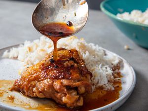 Chicken adobo with white rice on a plate