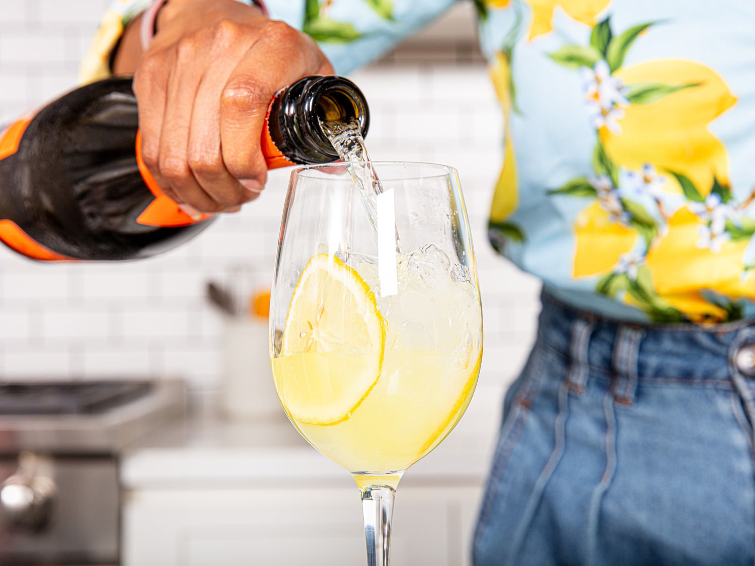 Pouring champagne into glass