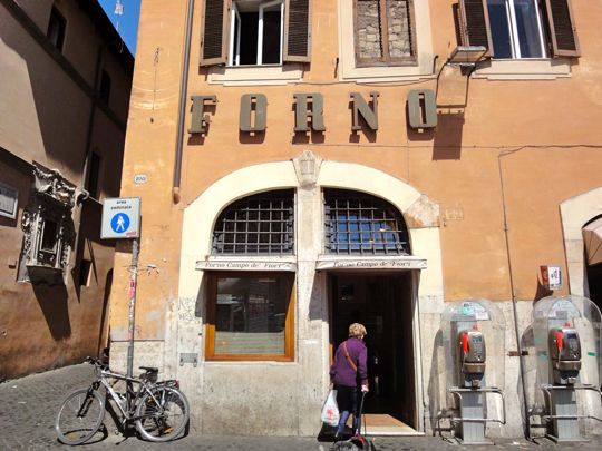 An exterior shot of Forno Campo d' Fiori, a bakery famous for their pizza bianca in Rome.