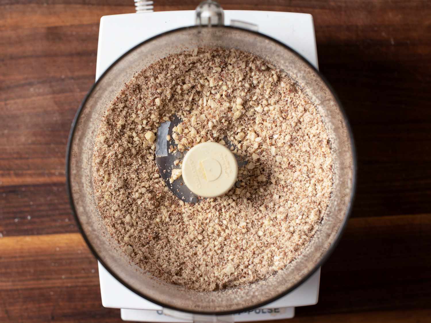 Pulverized almonds in a food processor