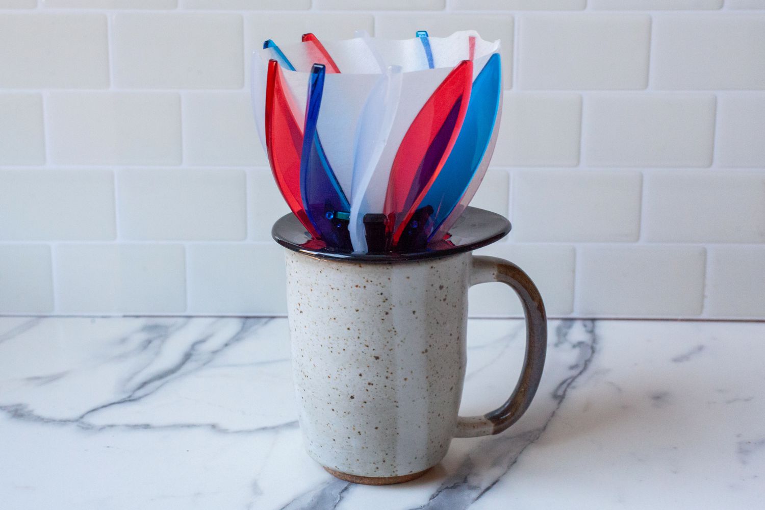 The Hario Suiren pour-over dripper on top of a coffee mug.