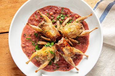 Quail with plum sauce.