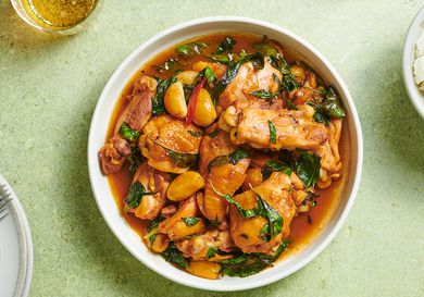 The three cup chicken in a white ceramic bowl.