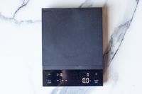 Hario Polaris Coffee Scale with a display showing weight and time