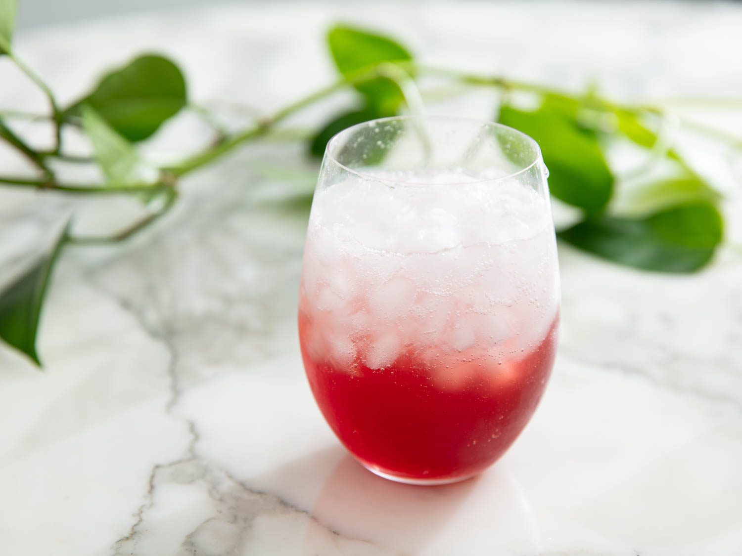 A glass of cherry club soda.