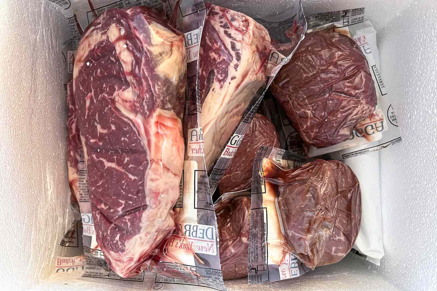 DeBragga Vacuum sealed cuts of raw beef in a styrofoam container