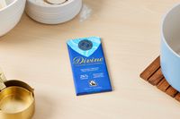 A Divine chocolate bar on a kitchen countertop.