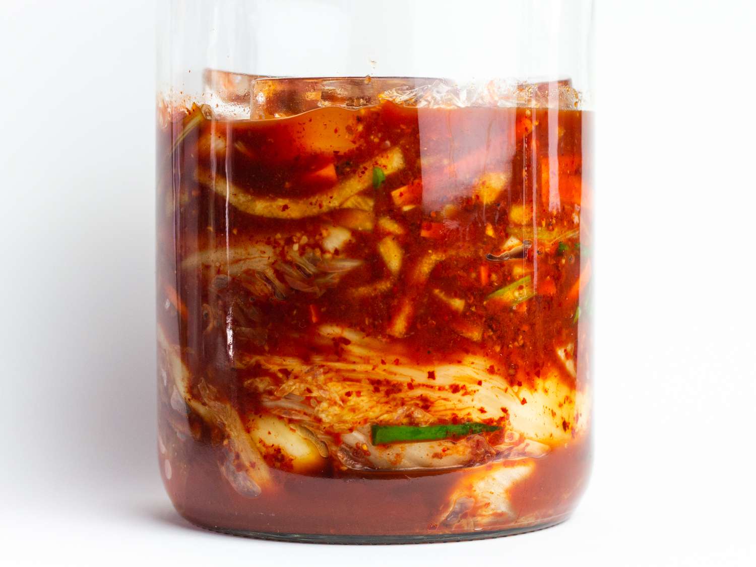 baechu kimchi in a fermentation jar after 24 hours