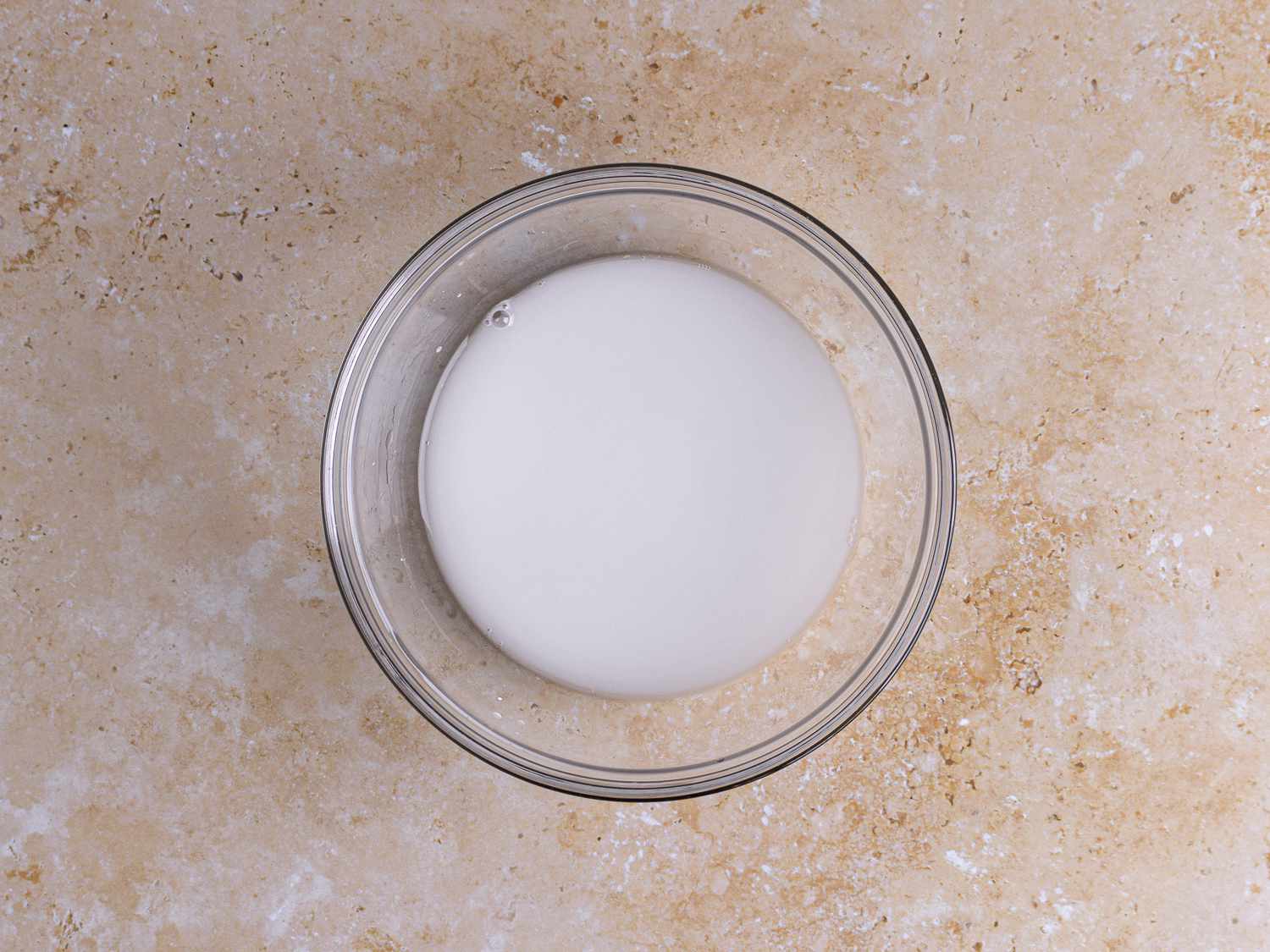 Corn starch and water mixed in a small bowl.