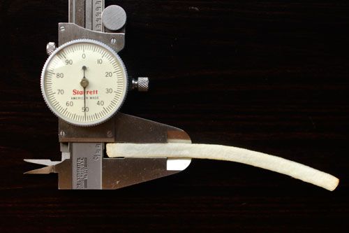Measuring frozen McDonald's french fry with calipers.
