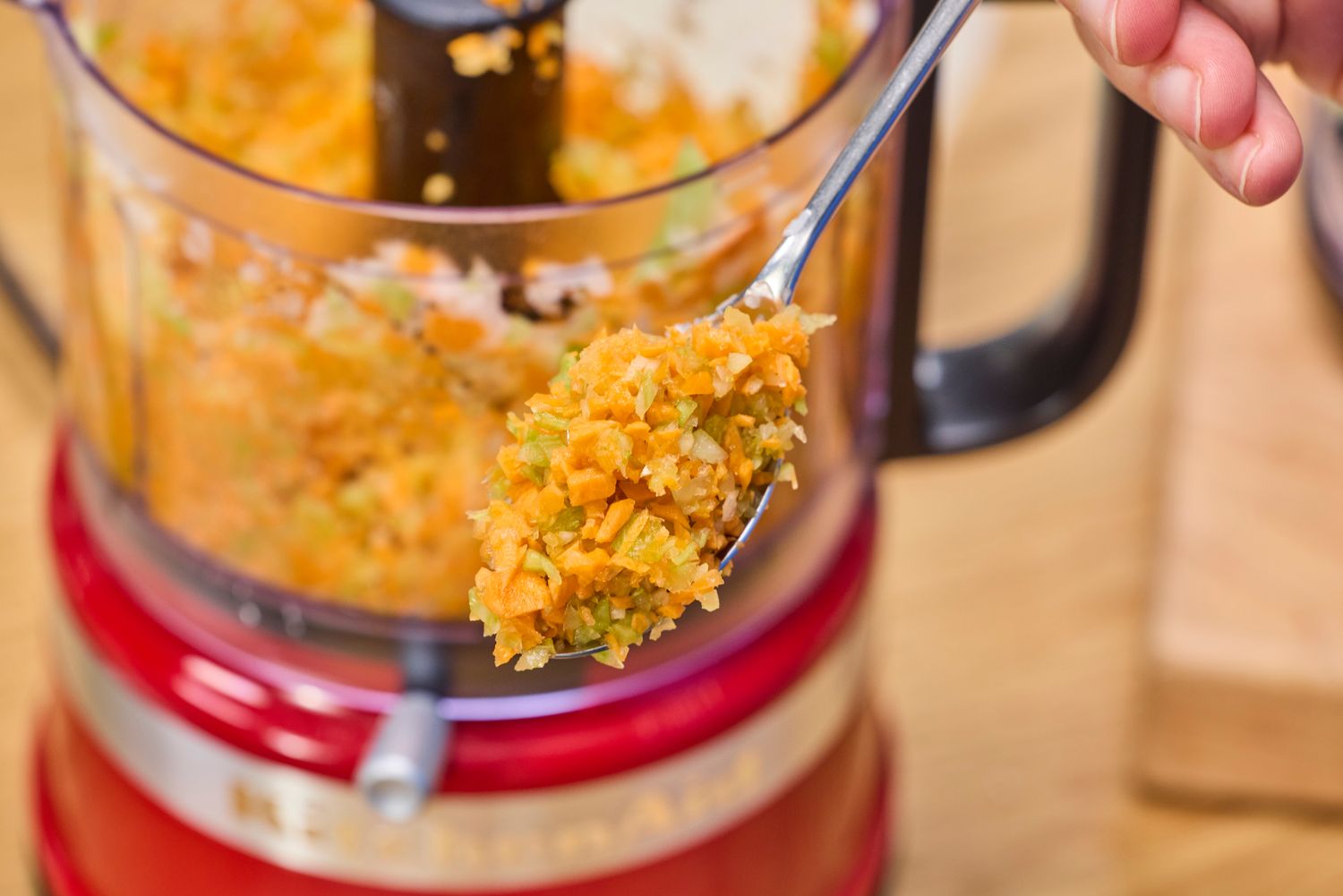 Veggies chopped in the KitchenAid 3.5-Cup Food Chopper on a fork