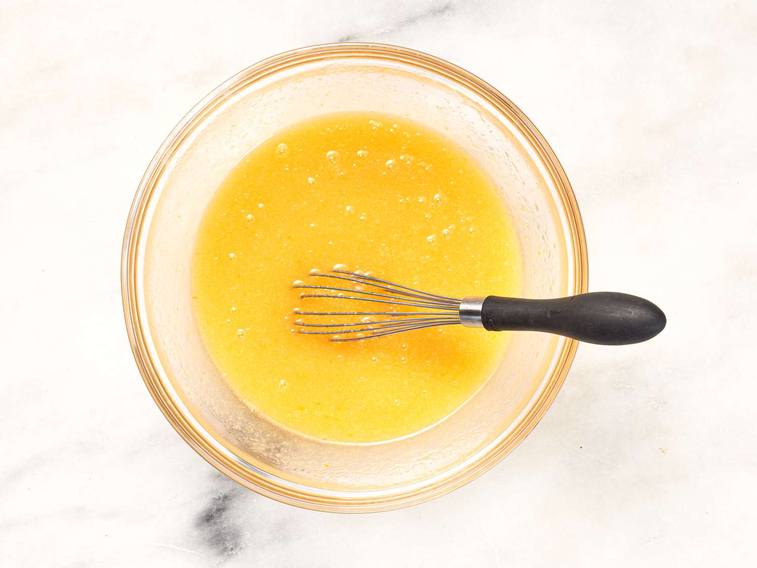 Overhead view of whisked eggs