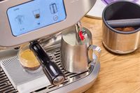 Milk is steamed using the Breville The Oracle Dual Boiler Espresso Machine frother