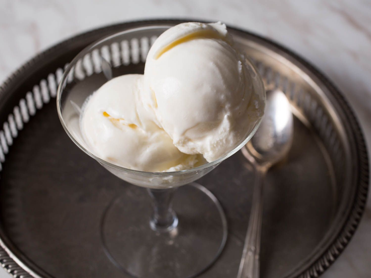 A stemmed serving bowl of Philadelphia-style ice cream.
