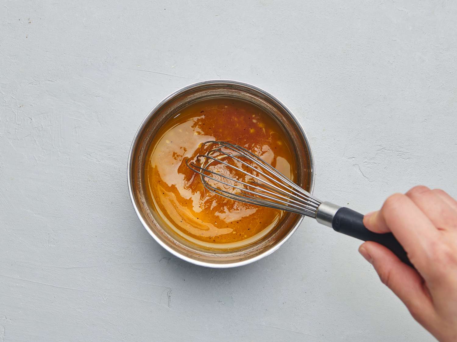 Minced garlic, red wine vinegar, extra-virgin olive oil, Kosher salt, and freshly ground black pepper whisked together in a small bowl
