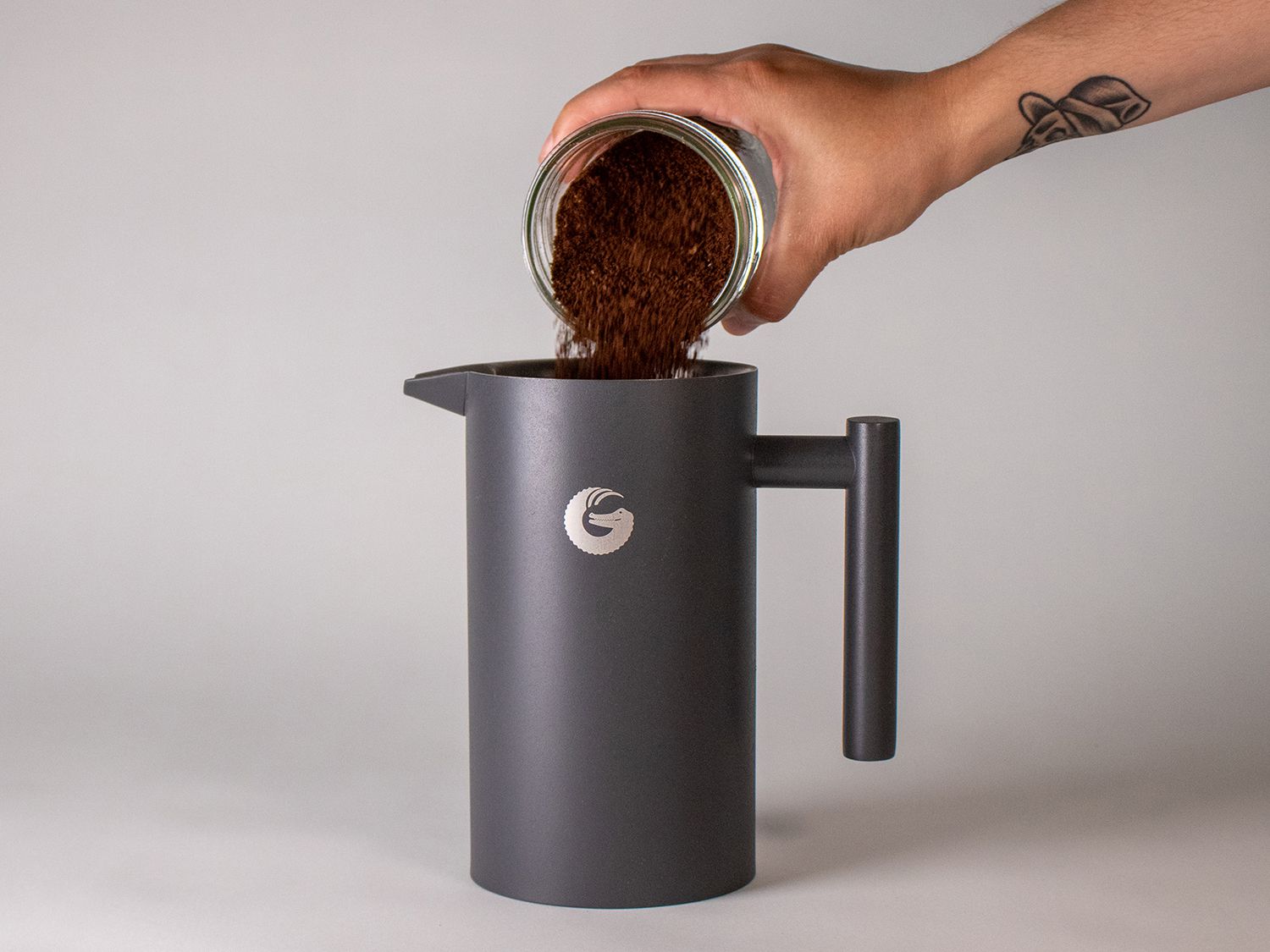 Coffee grounds are added to a Gator French Press for Cold Brew