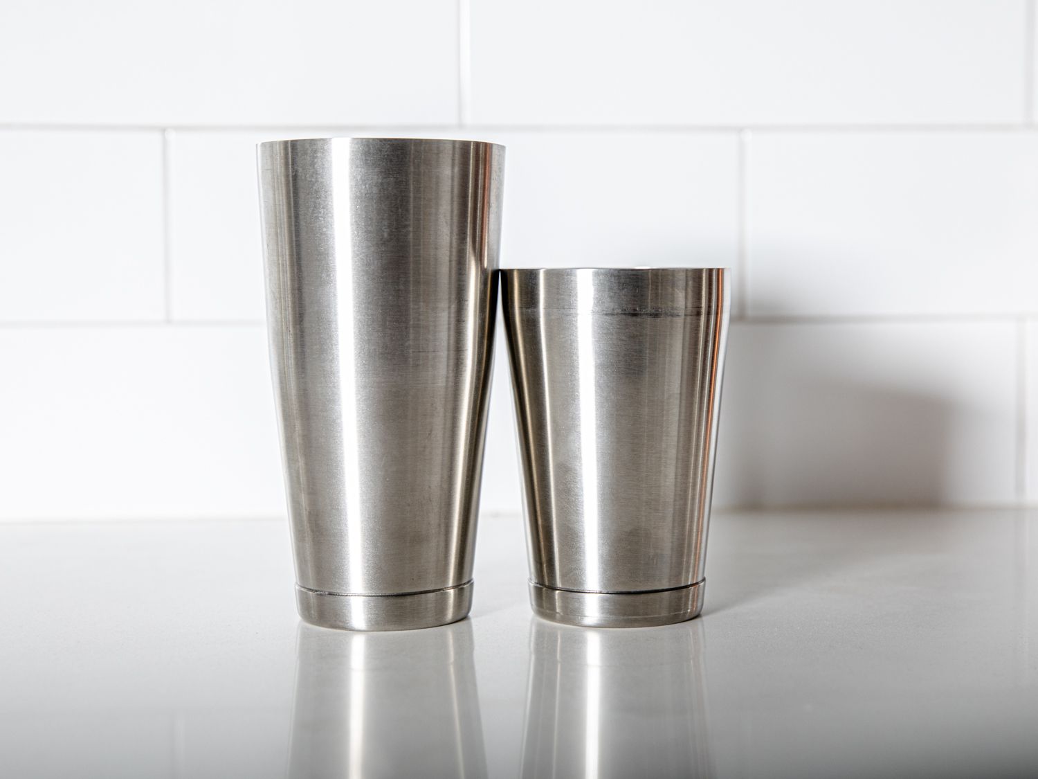 The Pina cocktail shaker on a gray countertop.