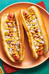 Overhead view of two hotdogs on a plate