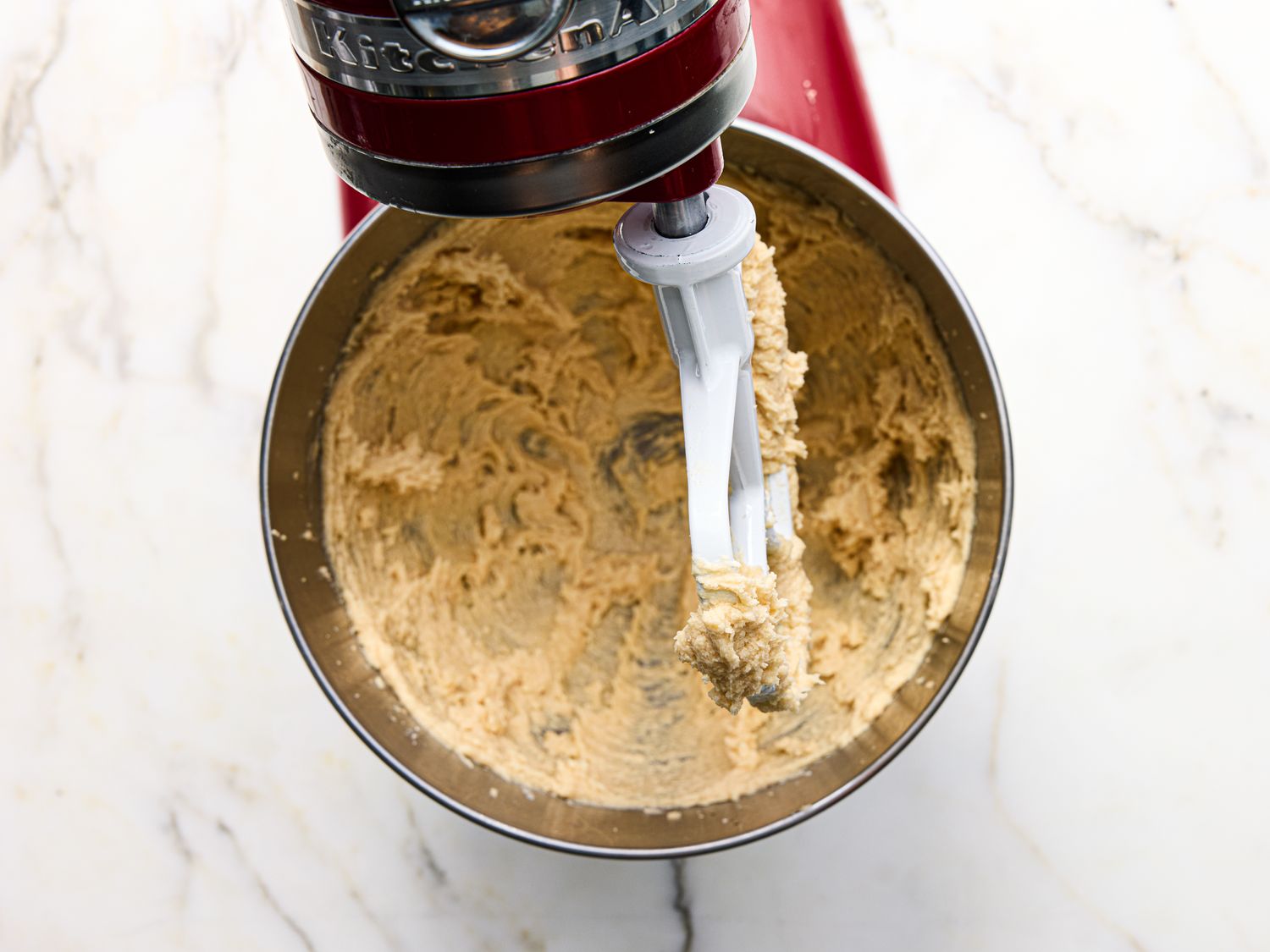 Mixing tahini cookie dough in a stand mixer bowl