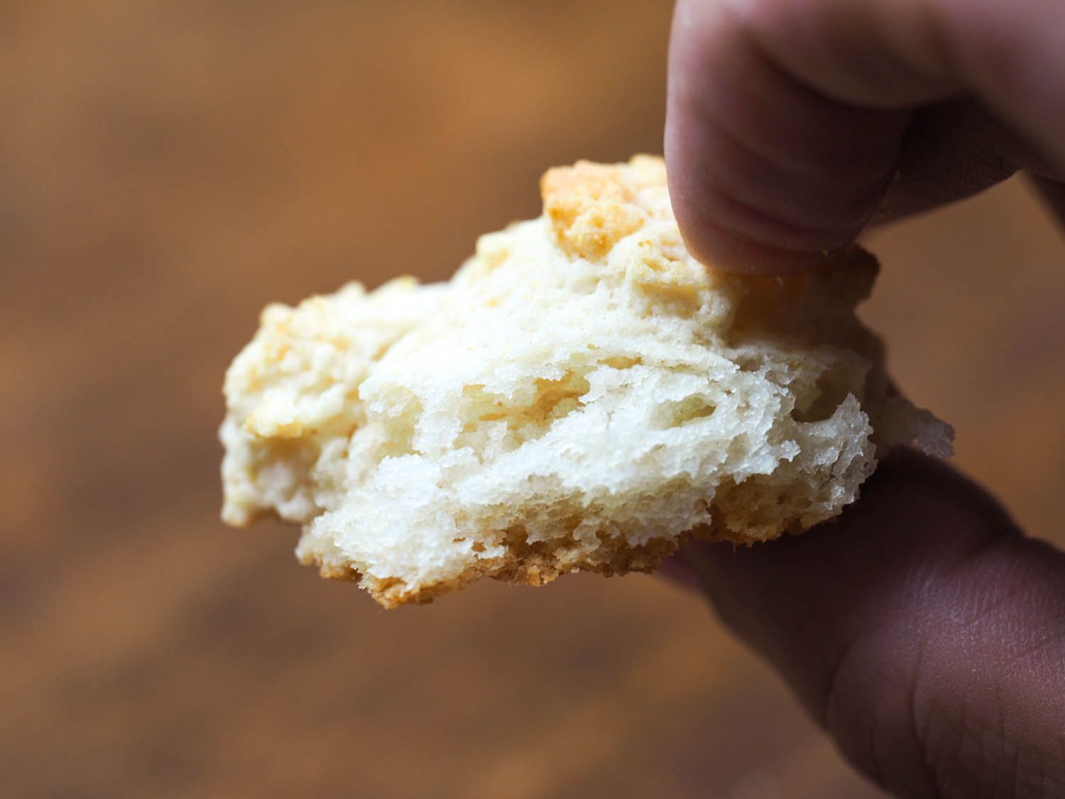 Close-up shot of the fluffy interior of a drop biscuit.