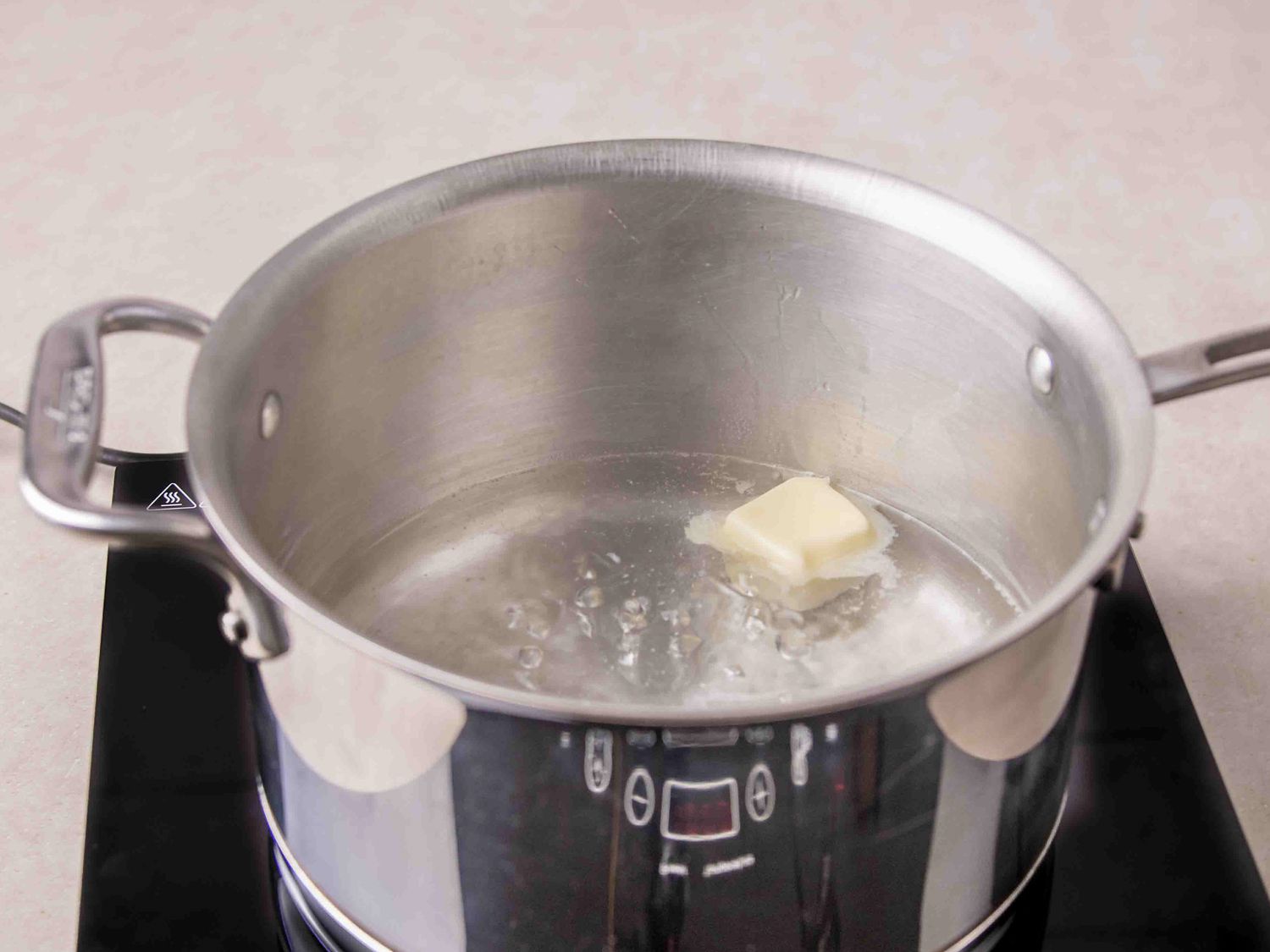 Overhead view of butter in pot 