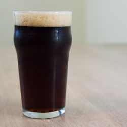A glass of British brown ale. 