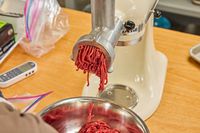 Close-up of grind meat from KitchenAid KSMMGA Metal Food Grinder Attachment